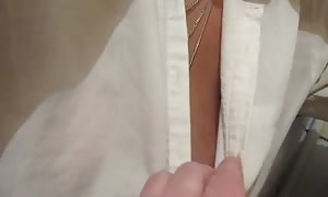 touching her tits below the shirt