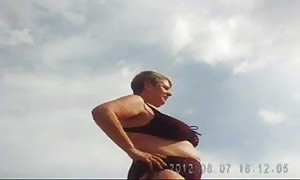 Russian mature huge boobed on the beach! novice!