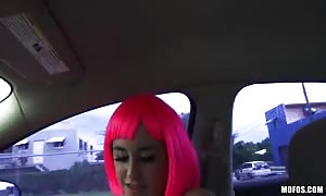 hottie
 in pink wig having in depth sex in the automobile