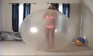 youngster in latex ballong